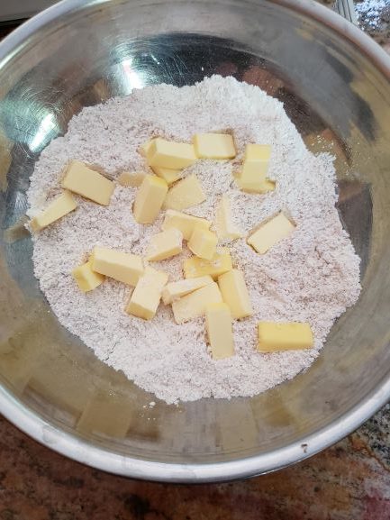 cubed butter into flour mixture