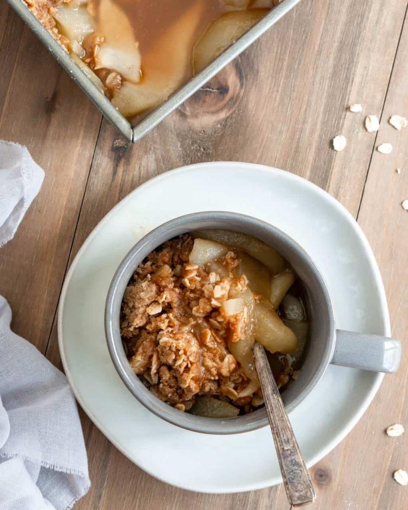 Pear Crisp in a mug with a Spoon