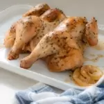 Chicken with herbs on a platter