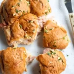 gluten-free sliders pulled apart on a tray