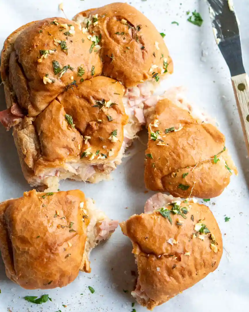 gluten-free sliders pulled apart on a tray