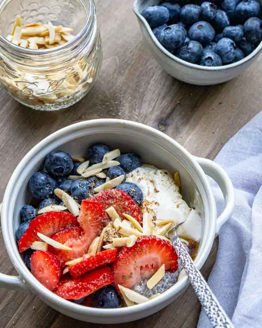 A bowl of chia pudding with fresh fruit toppings.