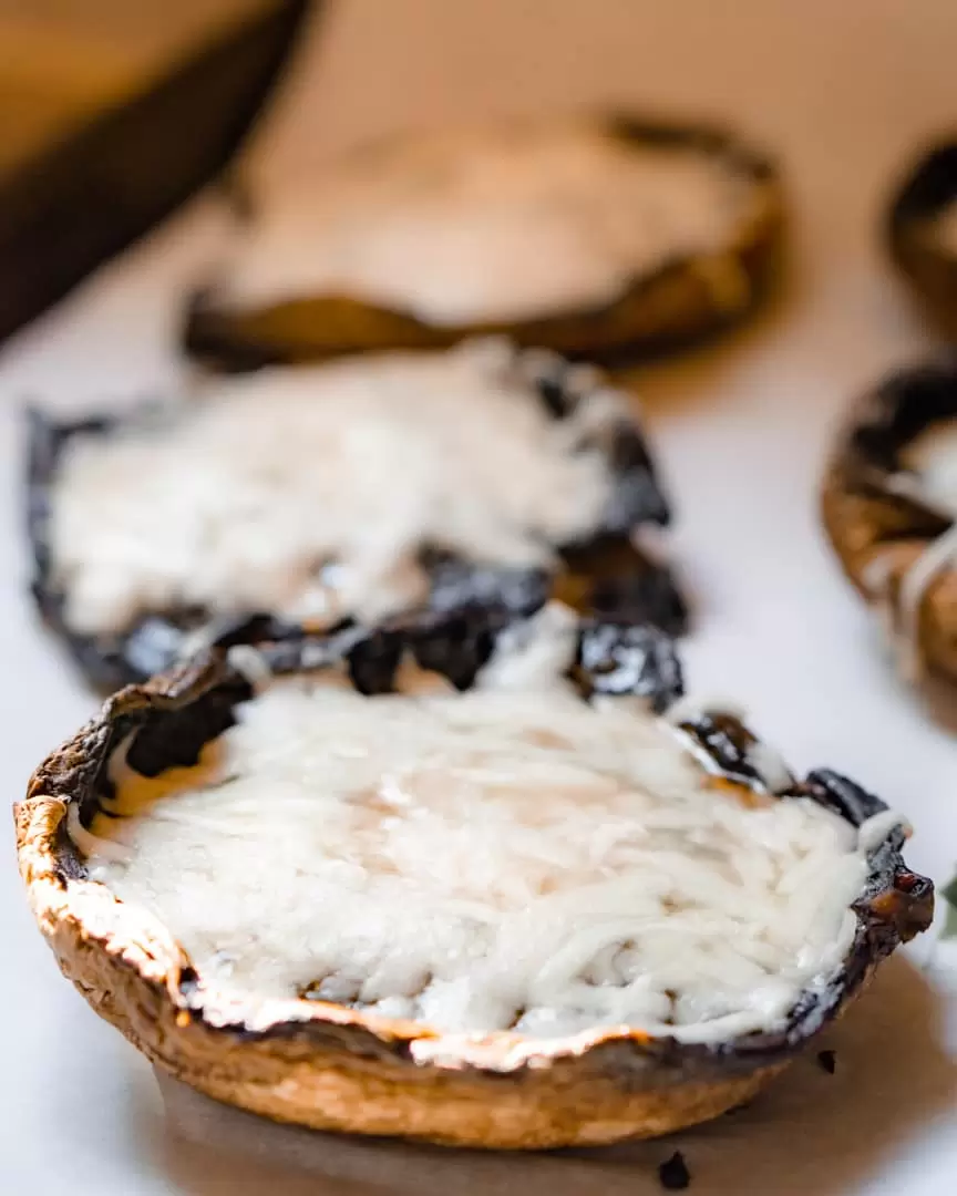 Portobello mushroom grilled with melted mozzarella cheese.