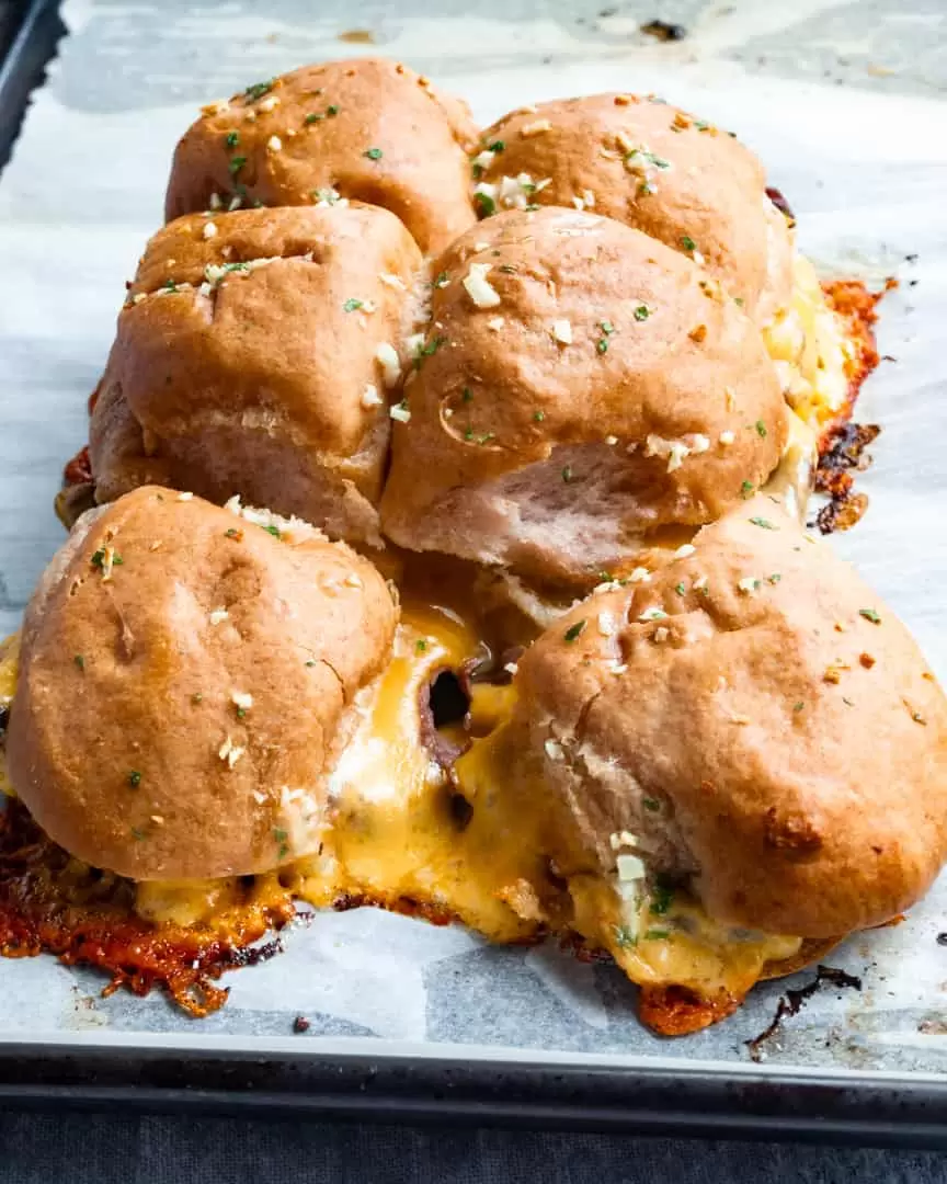 Roast beef sliders baked and pulled apart