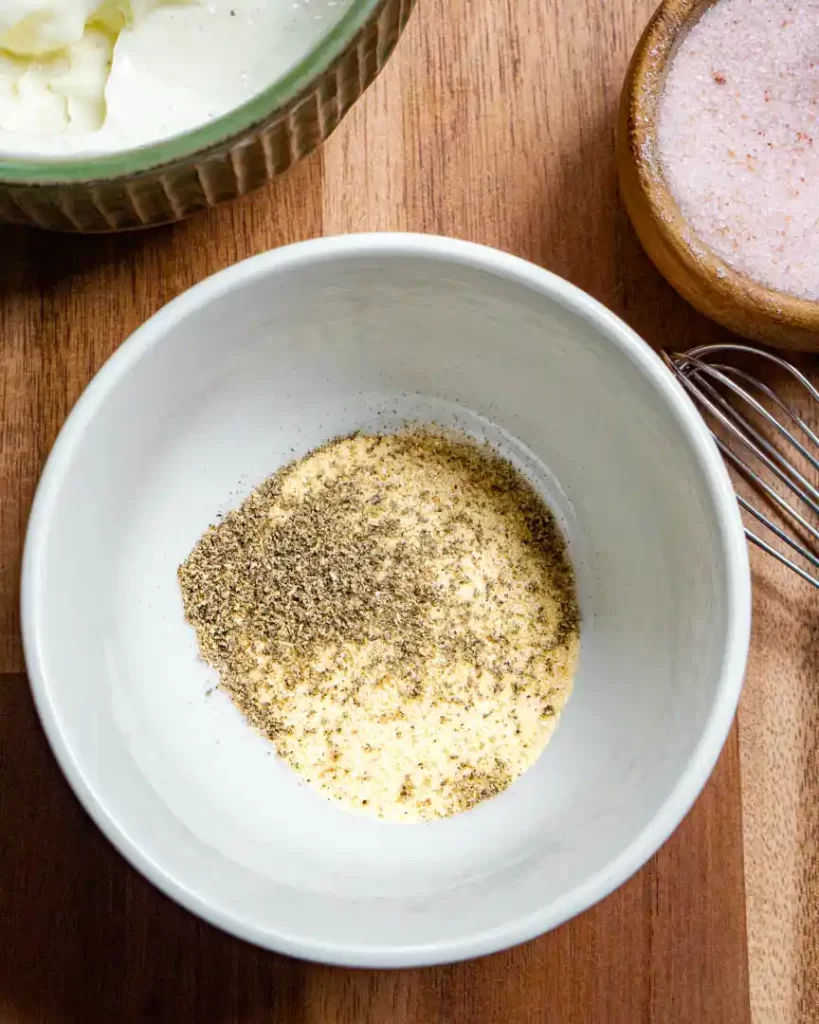 A small bowl with seasonings.