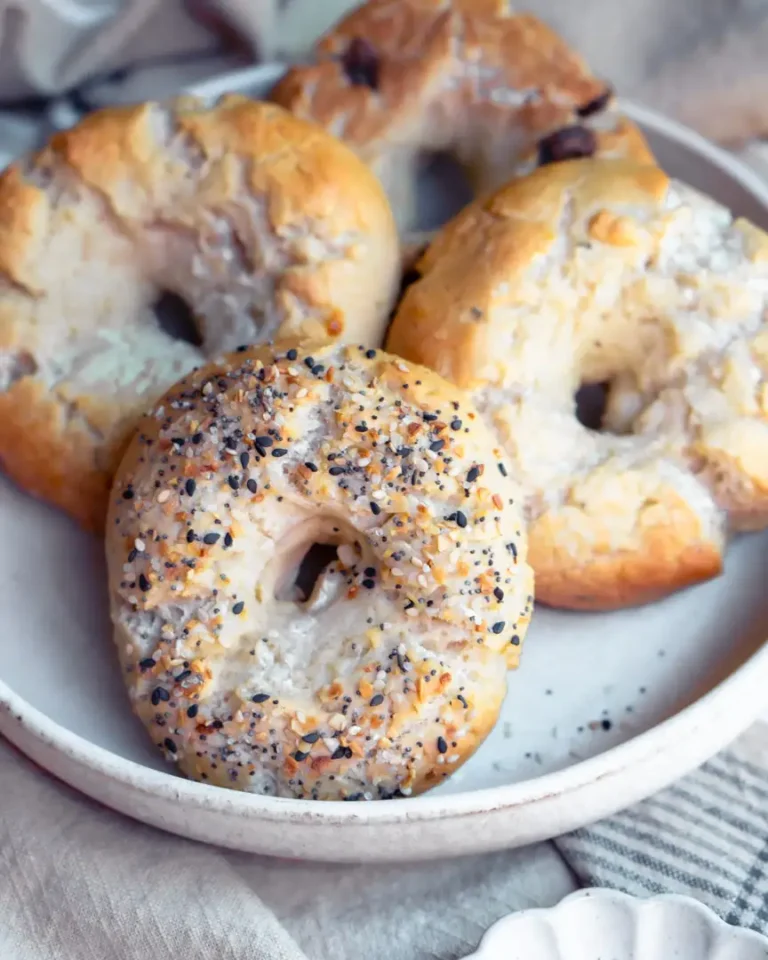 A plate of assorted high protein bagels.