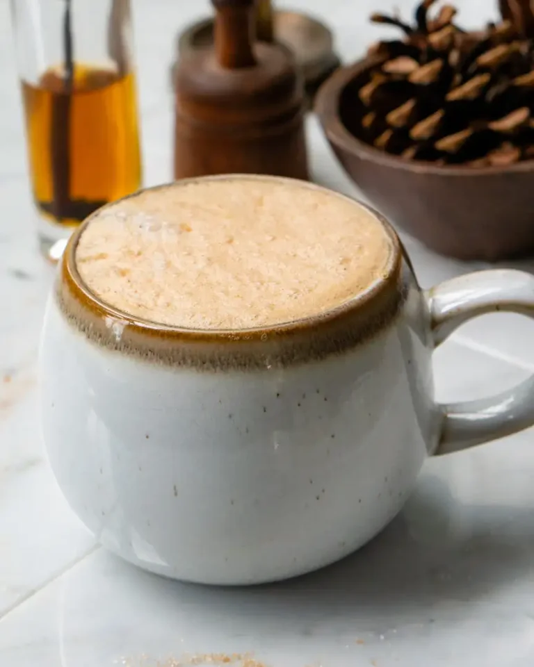 A mug filled with snickerdoodle latte.