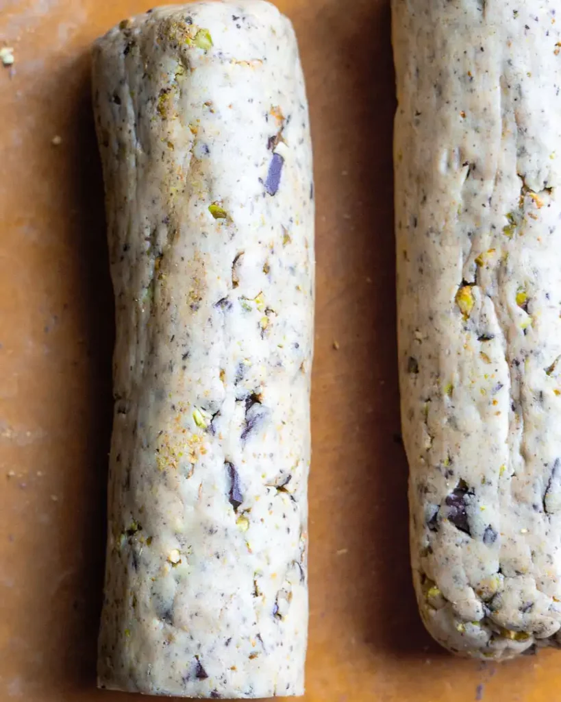 Cookie dough rolled into two separate logs.