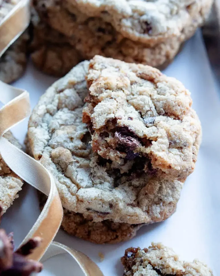 A broken cookie on top of of another cookie.