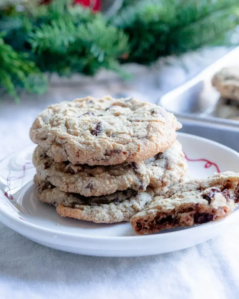 Cookies stacked on a plate.